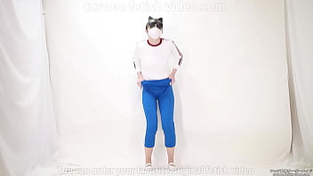 Girl pulls trousers down with her hands and digs them into her crotch