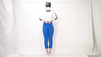 Girl pulls trousers down with her hands and digs them into her crotch