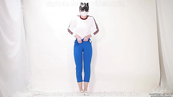 Girl pulls trousers down with her hands and digs them into her crotch