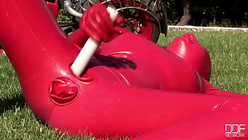 Busty babe toying in full latexwear