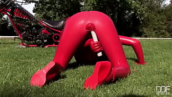 Busty babe toying in full latexwear