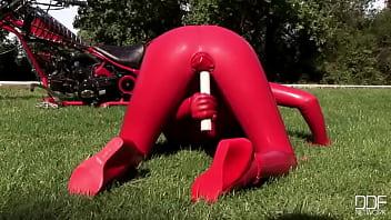 Busty babe toying in full latexwear