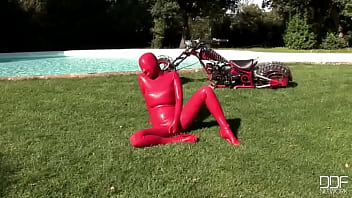 Busty babe toying in full latexwear