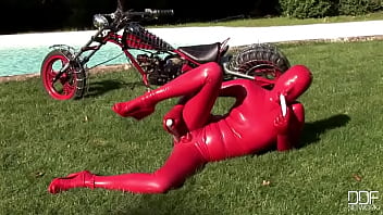 Busty babe toying in full latexwear