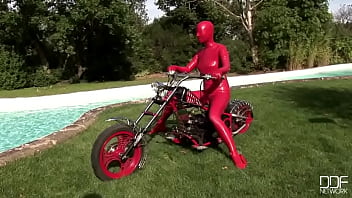 Busty babe toying in full latexwear