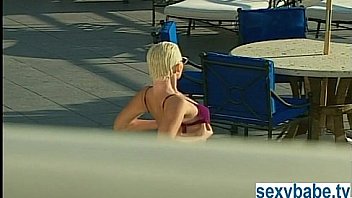 Super hot blonde by the pool