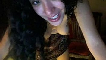 Brunette puting a dildo inside on webcam show