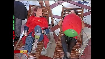 Cute lady in a miniskirt shows pantyhose upskirts on live television