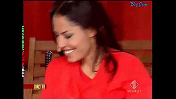 Cute lady in a miniskirt shows pantyhose upskirts on live television