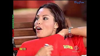 Cute lady in a miniskirt shows pantyhose upskirts on live television