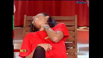 Cute lady in a miniskirt shows pantyhose upskirts on live television