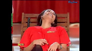 Cute lady in a miniskirt shows pantyhose upskirts on live television