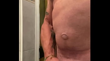 Stroking the man in the shower