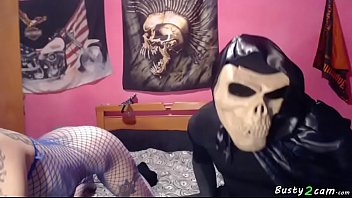 Blue eyed busty brunette playing with the d