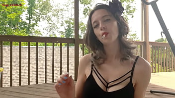Sage eldritch cigarette smoking in red lipstick