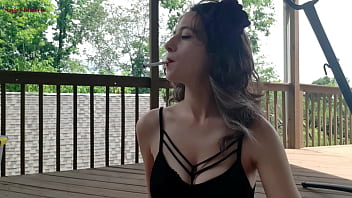 Sage eldritch cigarette smoking in red lipstick