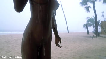 Skinny ebony village girl dancing naked in the rain with her perfect slim body