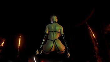 Mature busty pinhead women in latex outfit posing alone in hell cave