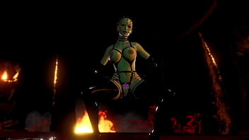 Mature busty pinhead women in latex outfit posing alone in hell cave