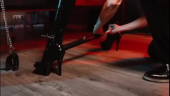 Spread Your Legs Pleaser Heels With Rubber Toe Socks And A Full Black Catsuit Caught In A Spreader Bar Ready To Be Used thumbnail