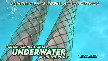 Green fishnet tights underwater in the pool