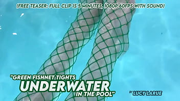 Green fishnet tights underwater in the pool