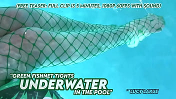 Green fishnet tights underwater in the pool