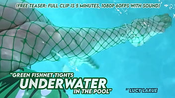 Green fishnet tights underwater in the pool