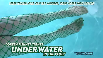 Green fishnet tights underwater in the pool
