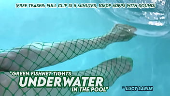 Green fishnet tights underwater in the pool