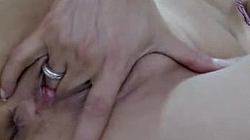 Sexy busty milf on webcam fingers her pussy hard and deep