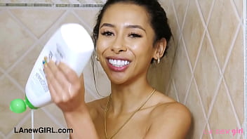 Pretty brunette enjoys a sensual bath