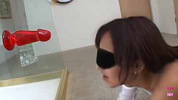 The individual manipulates veronique's genitalia and inserts a large phallus into her vaginal cavity The individual manipulates veronique's genitalia and inserts a large phallus into her vaginal cavity