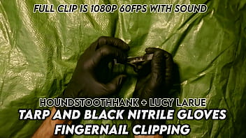 Tarp And Black Nitrile Gloves Fingernail Clipping thumbnail