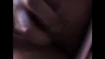 Latin teen plays with wettness