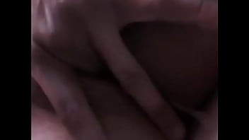 Latin teen plays with wettness