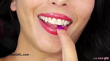 Striking dark haired muse naked close up