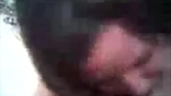 Chubby brunette blowing cock