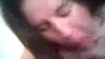 Chubby brunette blowing cock