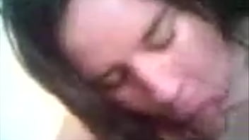 Chubby brunette blowing cock