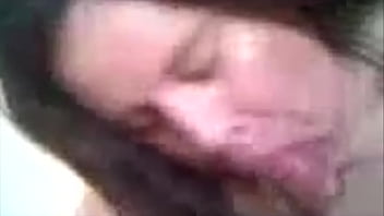 Chubby brunette blowing cock