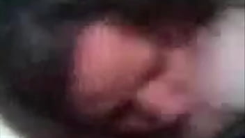 Chubby brunette blowing cock