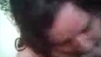 Chubby brunette blowing cock