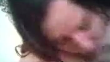 Chubby brunette blowing cock