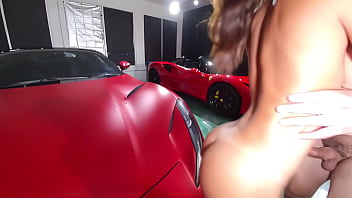Busty beauty has sex in an expensive garage her shaved pussy was filled with sperm