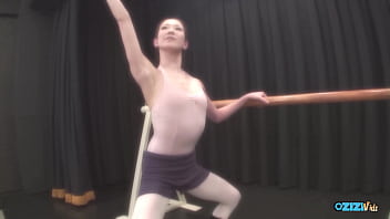 The skilled asian dancer performs for her audience exuding delight