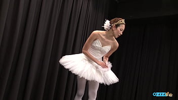 The skilled asian dancer performs for her audience exuding delight