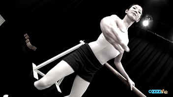 The skilled asian dancer performs for her audience exuding delight