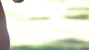 Naked beauty with big boobs shows shaved pussy