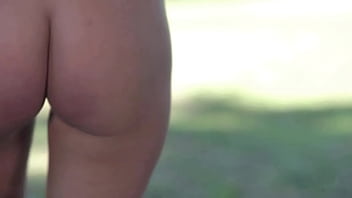 Naked beauty with big boobs shows shaved pussy